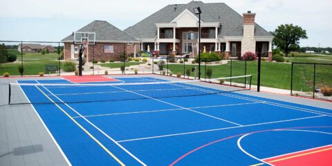 Blue and red outdoor court in a backyard
