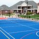 Blue and red outdoor court in a backyard