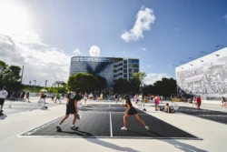 people gathering in Jungle Plaza to play pickleball